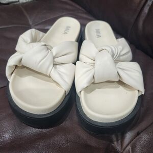 MIA Cream and Black Mules with Bow Accent